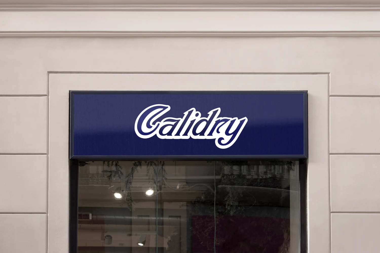 A blue Calidry sign above a glass doorway on a light building facade